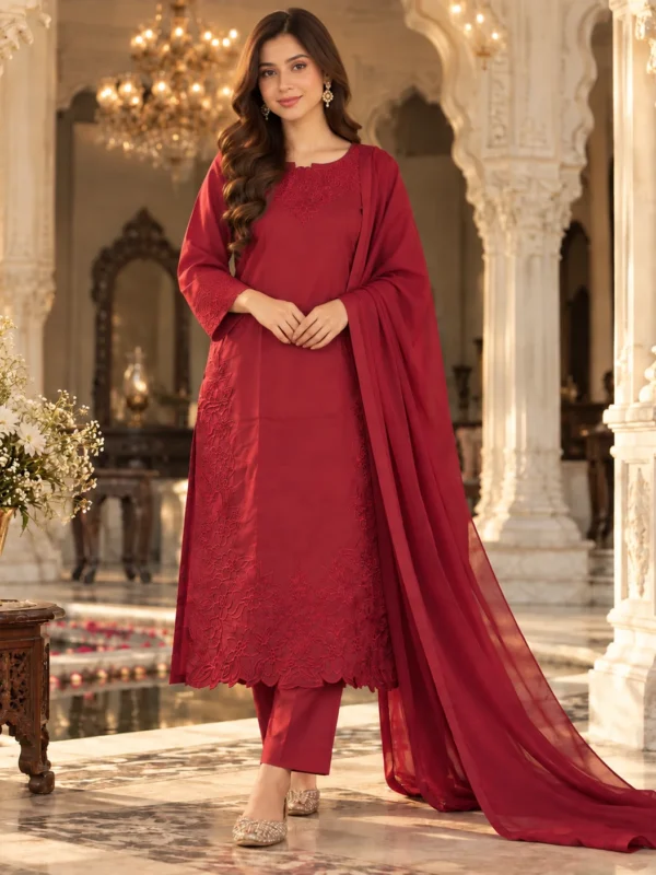 Model wearing red embroidered cotton silk 3-piece stitched suit - front